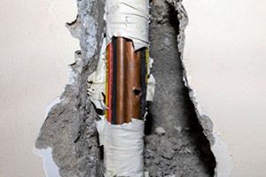 Emergency plumbing repair work being performed